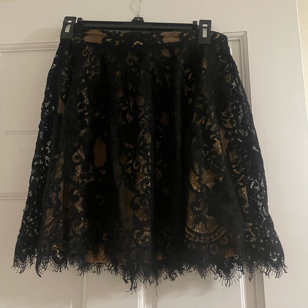 Michaels Kors Lace mini skirt.